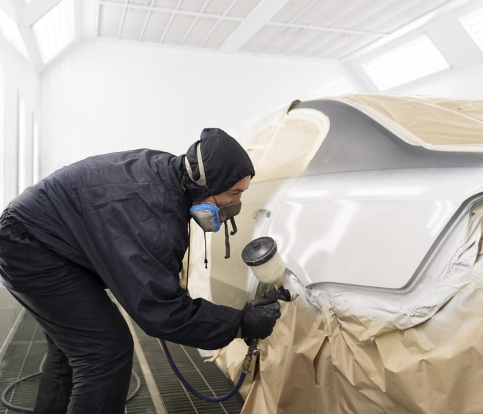 service-worker-painting-car-auto-service